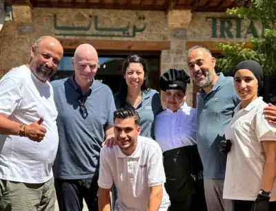 Gianni Infantino with the Triana team outside the restaurant entrance in Chefchaouen