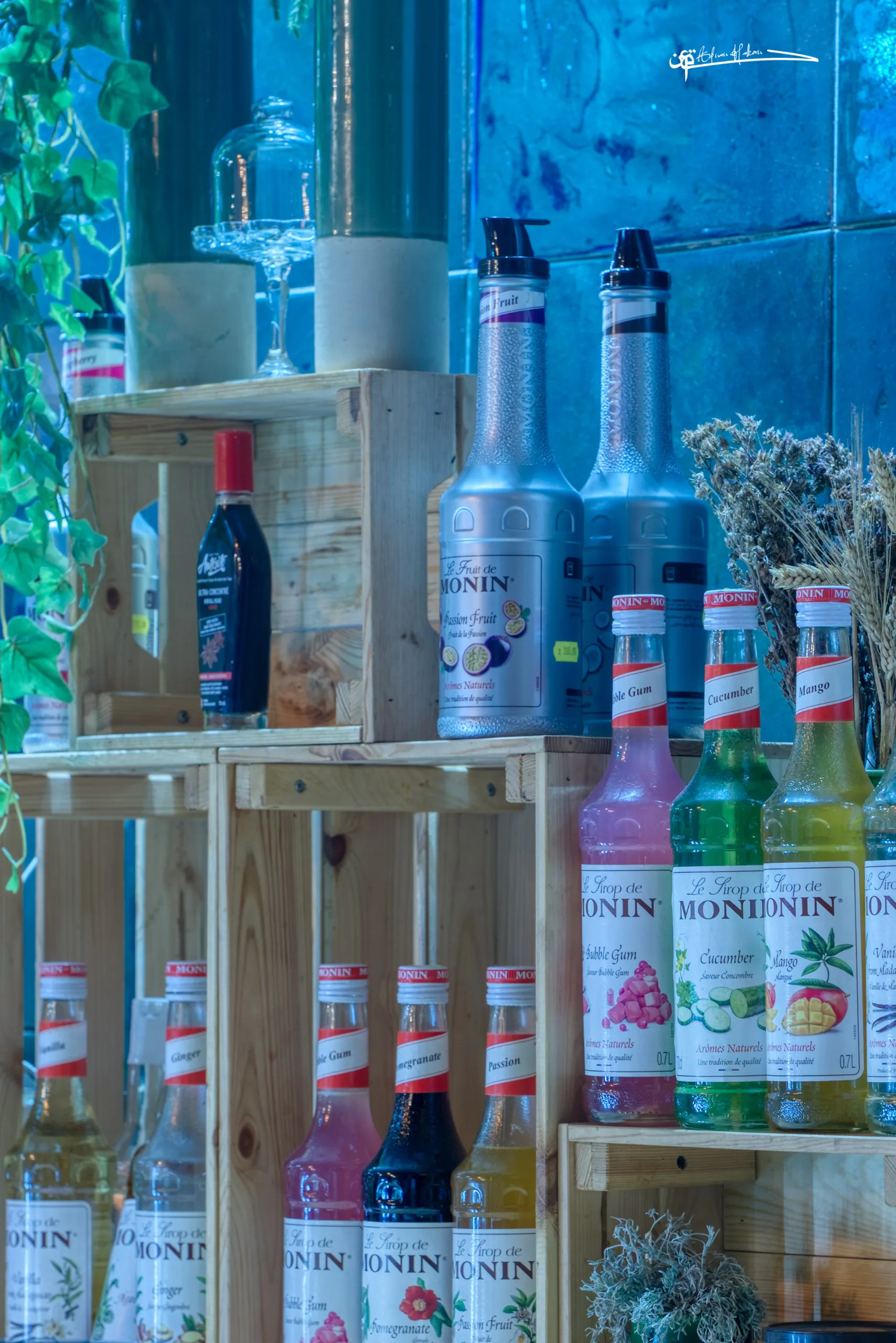 Cocktail syrups and bar ingredients at Triana rooftop bar in Chefchaouen