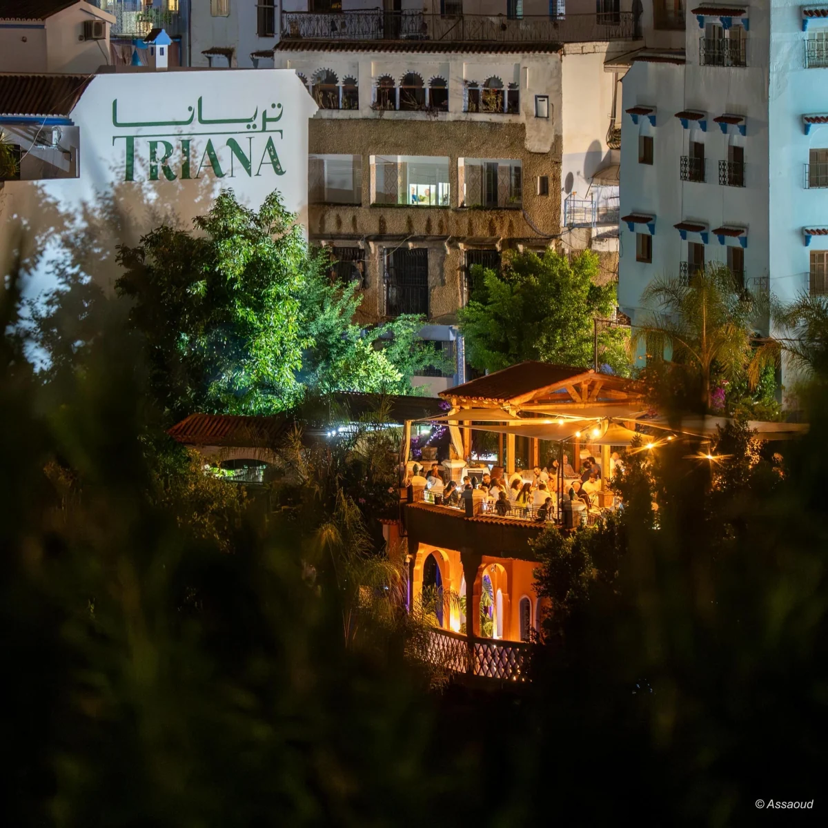 Guests sharing a warm moment at Triana Café & Restaurant in Chefchaouen