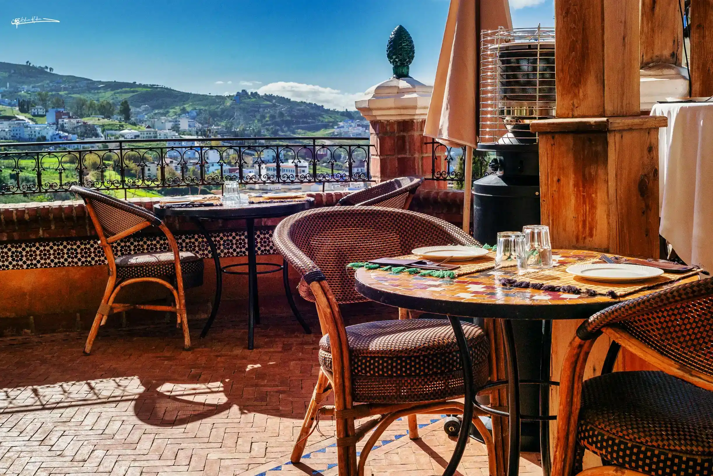 Sunset rooftop terrace at Triana with mountain views in Chefchaouen